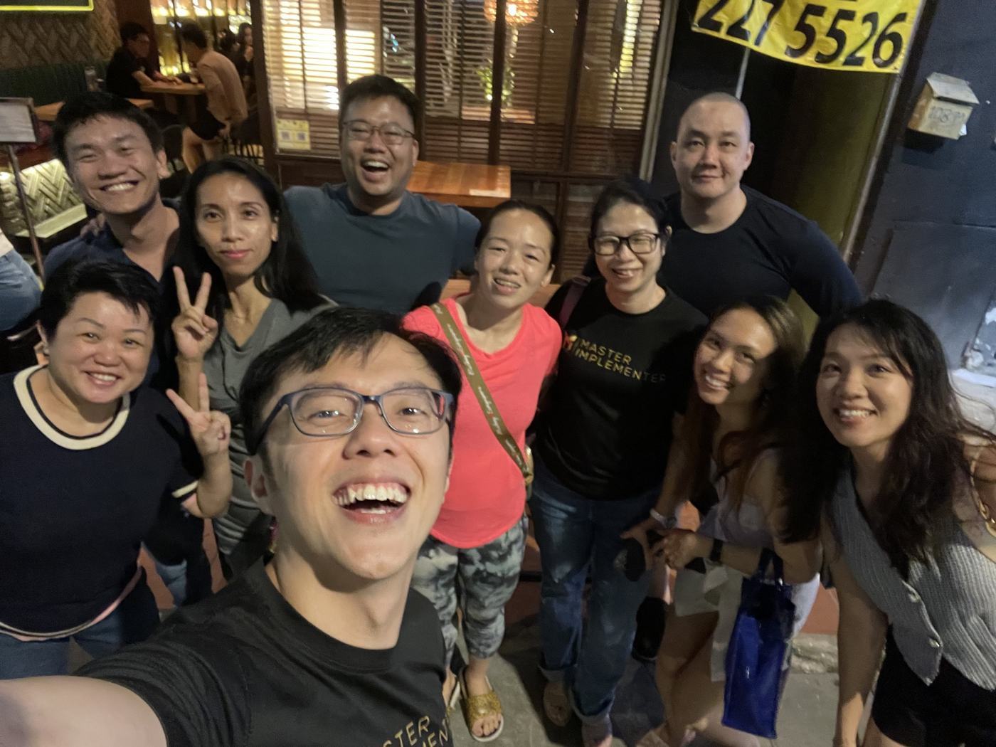 A Master Implementers cohort in black MI tees.