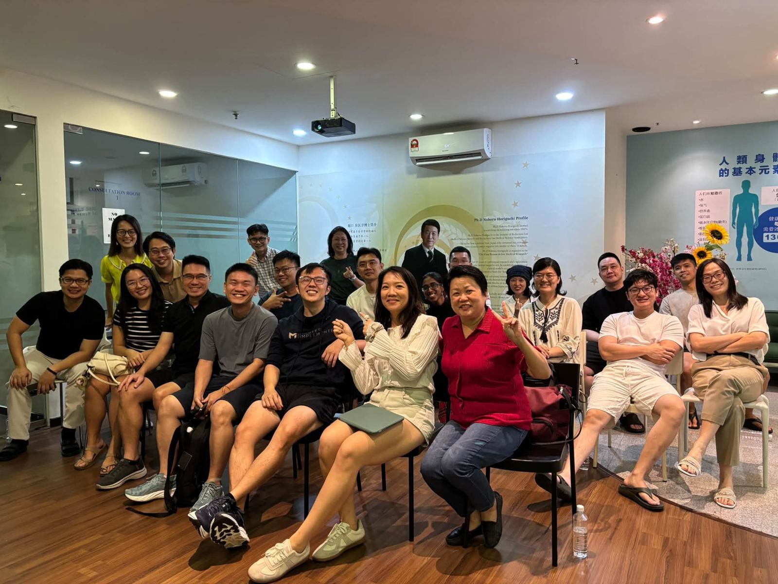 Marc Teo with Master Implementers clients at an evening event in Singapore, August 2026.